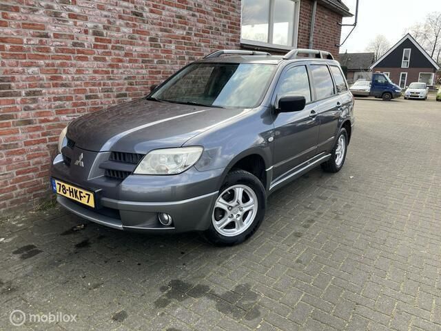 Grijs Gebruikt 2009 Mitsubishi Outlander Invite+ SUV | € 3.950 - Afbeelding 1/4