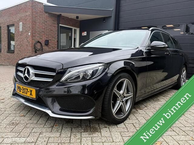 Zwart Gebruikt 2017 Mercedes C180 Sport Edition Stationwagen | € 19.949 (Goede deal) - Afbeelding 1/4
