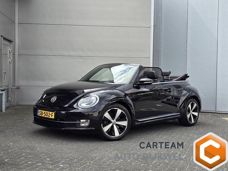 Zwart Gebruikt 2014 VW Beetle Sport Cabriolet | € 18.940 (Eerlijke prijs) - Afbeelding 1/4