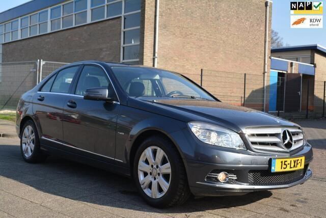 Grijs Gebruikt 2010 Mercedes C180 Avantgarde Sedan | € 6.500 (Eerlijke prijs) - Afbeelding 1/4