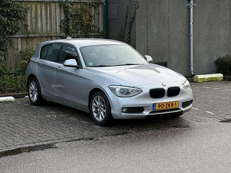Zilver Gebruikt 2012 BMW 114 Hatchback | € 5.990 (Super prijs) - Afbeelding 1/4