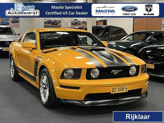 Oranje Gebruikt 2007 Ford Mustang GT Coupé | € 25.950 - Afbeelding 1/4