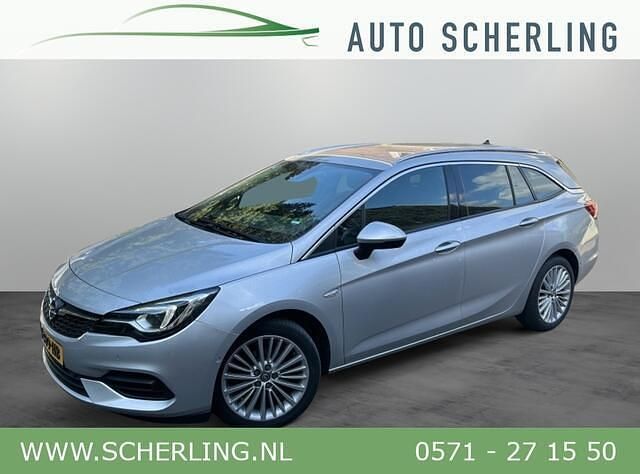 Grijs, metallic lak Gebruikt 2020 Opel Astra Elegance Stationwagen | € 13.750 (Iets duurder) - Afbeelding 1/4