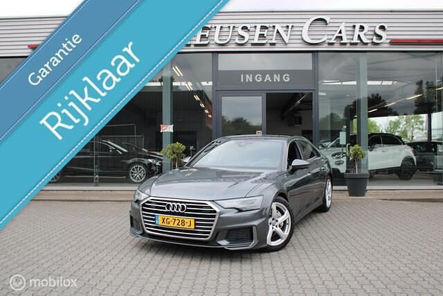 Grijs, metallic lak Gebruikt 2019 Audi A6 Sport Sedan | € 33.950 (Eerlijke prijs) - Afbeelding 1/4
