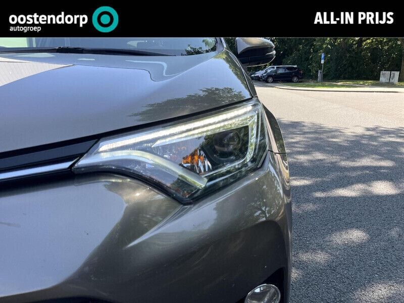 Bruin Gebruikt 2016 Toyota RAV4 Hybrid Executive SUV | € 24.950 (Eerlijke prijs) - Afbeelding 1/4