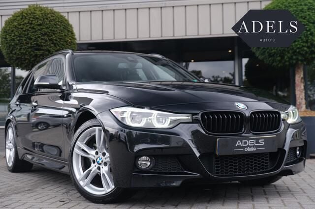 Zwart, metallic lak Gebruikt 2018 BMW 320 M Sport Stationwagen | € 17.995 (Goede deal) - Afbeelding 1/4