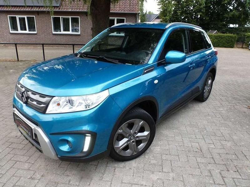 Blauw, metallic lak Gebruikt 2017 Suzuki Vitara SUV | € 15.950 (Eerlijke prijs) - Afbeelding 1/4