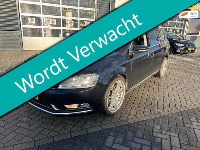 Zwart, metallic lak Gebruikt 2011 VW Passat Highline Stationwagen | € 6.395 (Eerlijke prijs) - Afbeelding 1/4