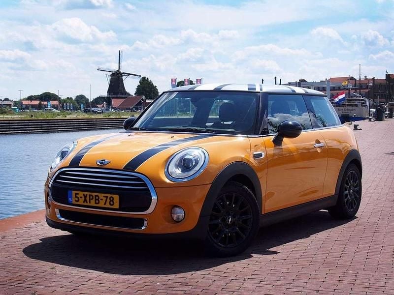 Oranje Gebruikt 2014 Mini Cooper D Business Hatchback | € 5.499 - Afbeelding 1/4