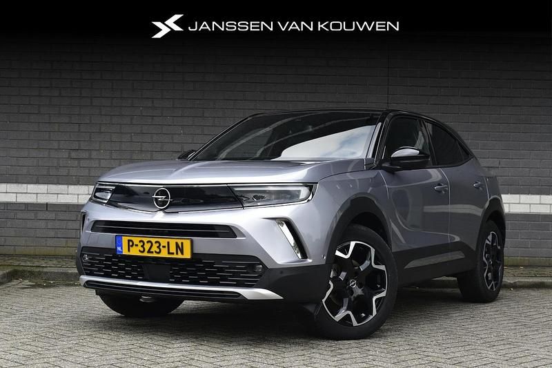 Grijs Gebruikt 2021 Opel Mokka Ultimate SUV | € 21.500 (Eerlijke prijs) - Afbeelding 1/3