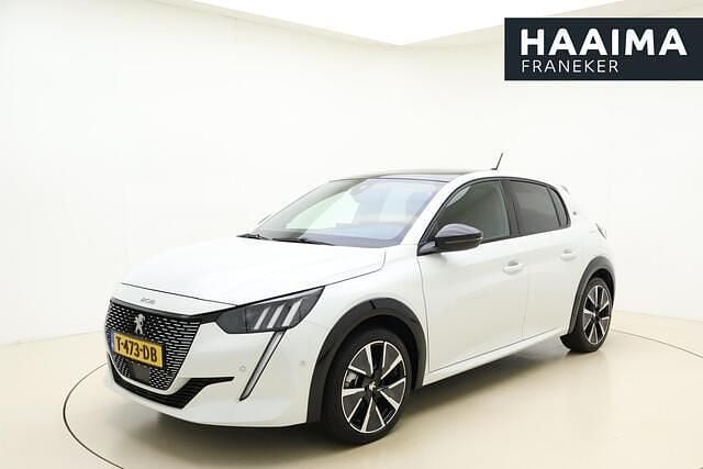 Wit Gebruikt 2022 Peugeot e-208 GT Hatchback | € 19.950 (Eerlijke prijs) - Afbeelding 1/4