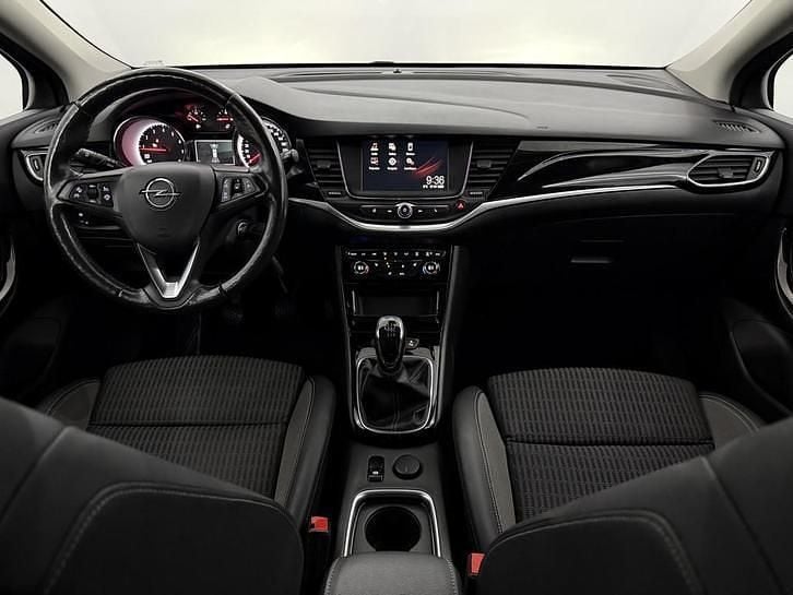 Occasion Opel Astra Elegance 112 PK (82 kW) 2021 Rood Stationwagen