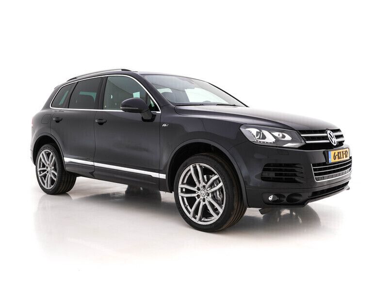 Deep black (zwart metallic) Gebruikt 2013 VW Touareg Comfortline SUV | € 16.945 (Iets duurder) - Afbeelding 1/4