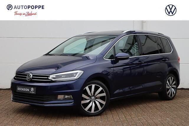 Blauw (metallic) Gebruikt 2017 VW Touran Highline MPV | € 25.950 (Goede deal) - Afbeelding 1/4
