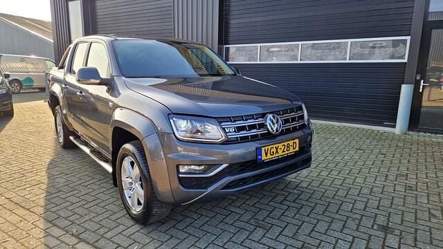 Grijs Occasion 2017 VW Amarok Comfortline Pickup | € 13.999 - Afbeelding 1/4