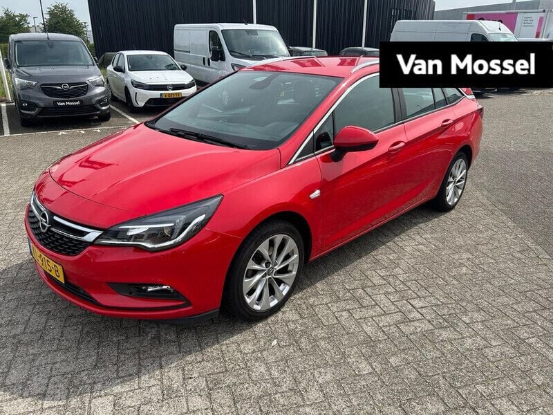 Rood Gebruikt 2016 Opel Astra Business Stationwagen | € 9.240 (Eerlijke prijs) - Afbeelding 1/4
