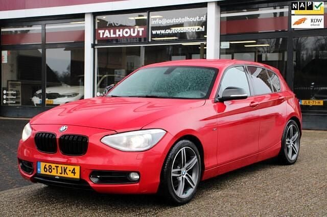 Rood Gebruikt 2012 BMW 118 Sport Line Hatchback | € 5.950 (Goede deal) - Afbeelding 1/4
