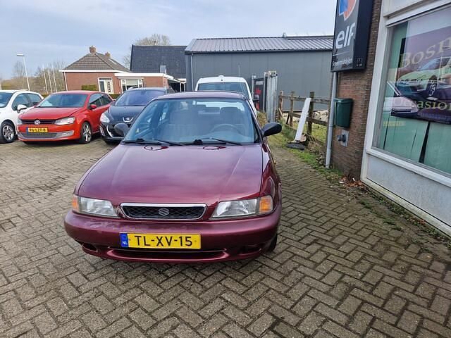 Occasion Suzuki Baleno GLX 97 PK (71 kW) 1998 Rood Sedan