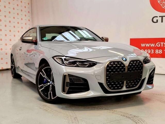 Grijs Gebruikt 2022 BMW M4 M Sport Coupé | € 58.000 - Afbeelding 1/4