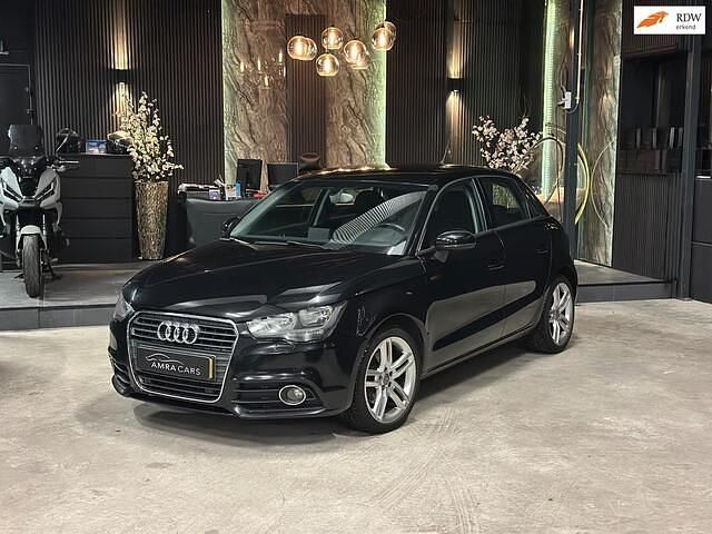 Zwart Gebruikt 2012 Audi A1 Sportback Attraction Hatchback | € 10.500 (Eerlijke prijs) - Afbeelding 1/4
