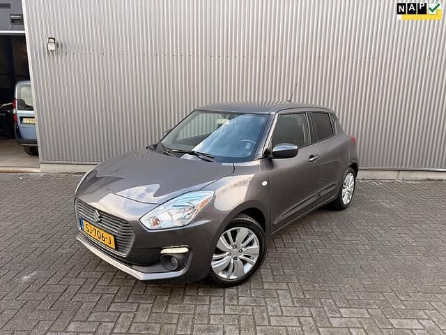 Grijs Occasion 2018 Suzuki Swift Hatchback | € 13.250 (Eerlijke prijs) - Afbeelding 1/4