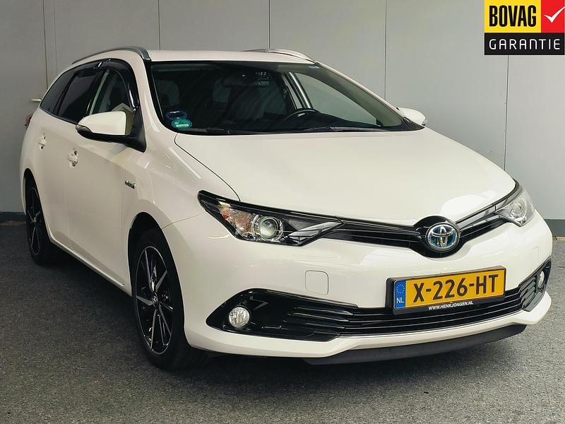 Wit Gebruikt 2018 Toyota Auris Hybrid Stationwagen | € 18.950 (Eerlijke prijs) - Afbeelding 1/4
