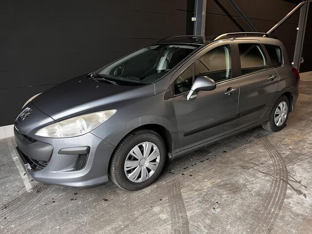 Grijs Gebruikt 2010 Peugeot 308 Stationwagen | € 1.700 (Eerlijke prijs) - Afbeelding 1/4