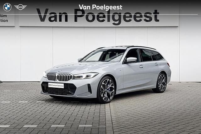 Grijs Occasion 2024 BMW 320 Executive Stationwagen | € 54.900 - Afbeelding 1/4