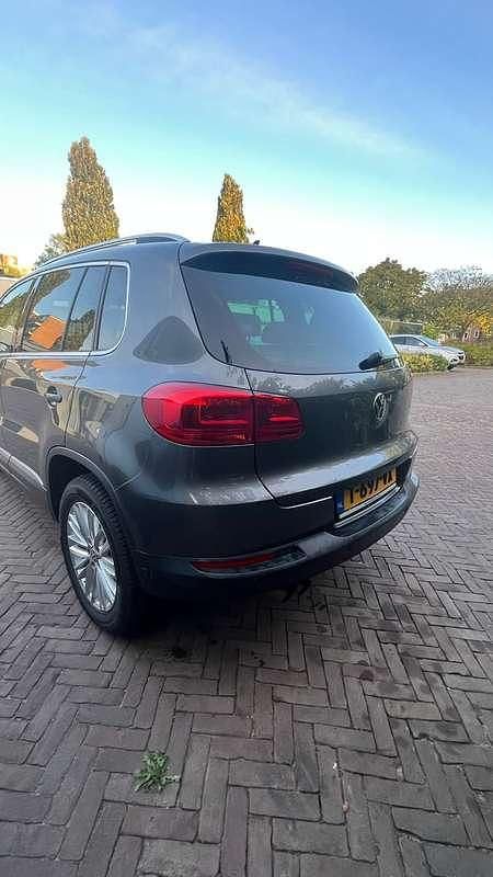 Grijs Gebruikt 2014 VW Tiguan Sport SUV | € 15.250 (Eerlijke prijs) - Afbeelding 1/4