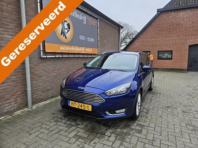 Blauw (metallic) Occasion 2016 Ford Focus Titanium Stationwagen | € 1.995 (Eerlijke prijs) - Afbeelding 1/4