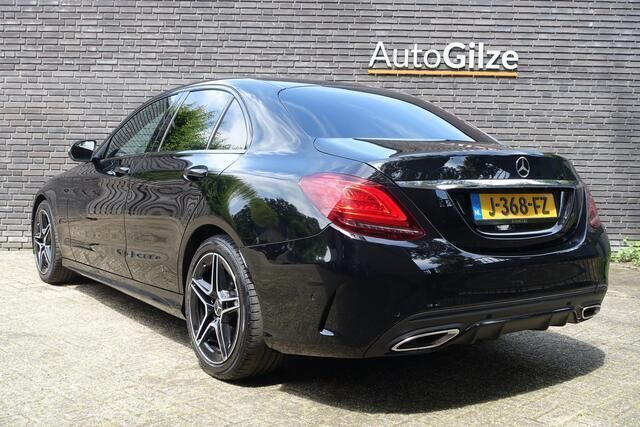 Occasion Mercedes C180 AMG Line Premium Plus 157 PK (115 kW) 2019 Zwart, metallic lak Sedan