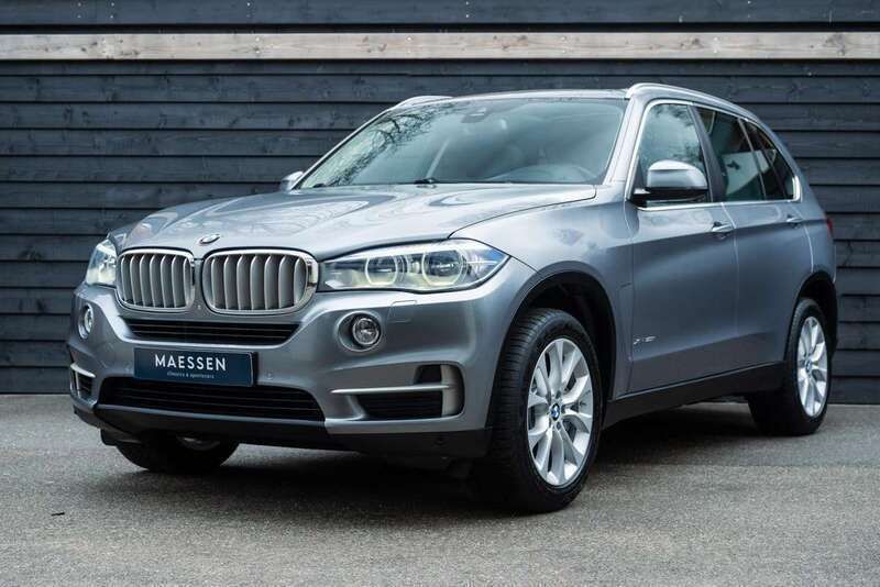 Grijs, metallic lak Gebruikt 2014 BMW X5 Executive SUV | € 27.950 (Goede deal) - Afbeelding 1/4