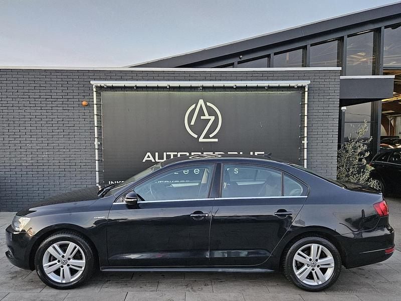 Zwart Gebruikt 2013 VW Jetta Hybrid Comfortline Sedan | € 6.450 (Eerlijke prijs) - Afbeelding 1/4