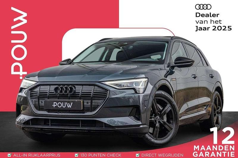 Grijs (metallic) Occasion 2020 Audi e-tron Business SUV | € 29.450 (Iets duurder) - Afbeelding 1/4