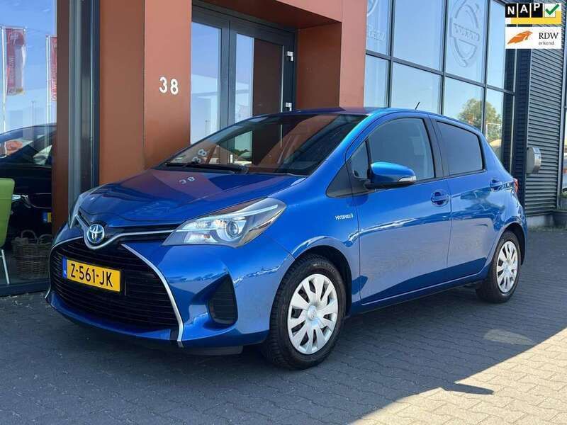 Blauw, metallic lak Gebruikt 2014 Toyota Yaris Hybrid Hatchback | € 9.890 - Afbeelding 1/4