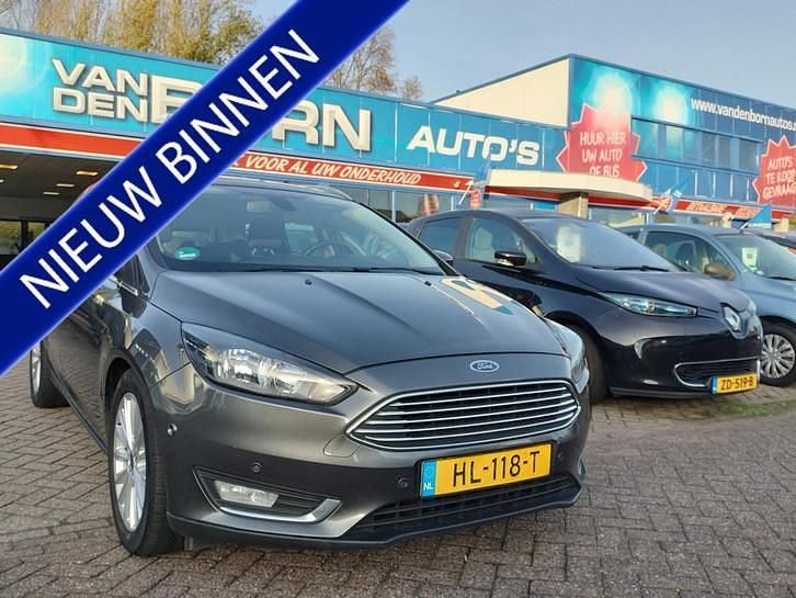 Grijs (metallic) Gebruikt 2015 Ford Focus Titanium Stationwagen | € 7.999 (Eerlijke prijs) - Afbeelding 1/4
