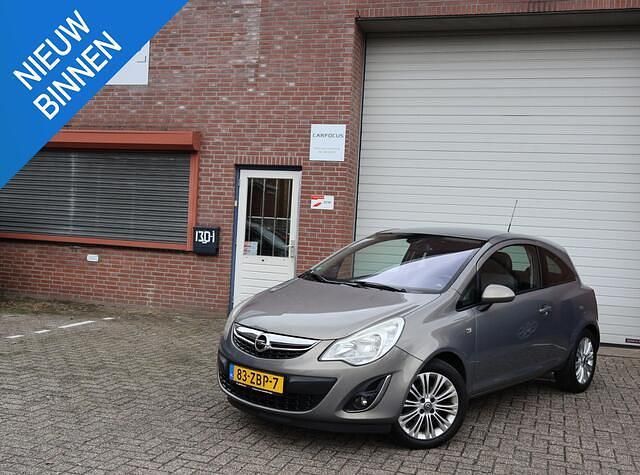 Bruin Gebruikt 2012 Opel Corsa Cosmo Hatchback | € 1.999 (Super prijs) - Afbeelding 1/4