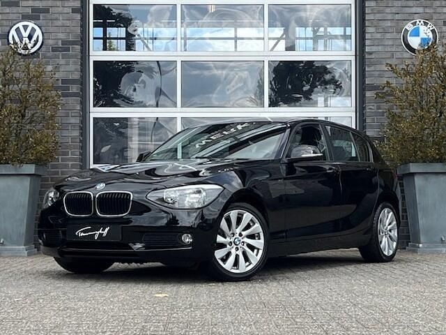 Zwart, metallic lak Gebruikt 2012 BMW 116 Hatchback | € 6.950 (Eerlijke prijs) - Afbeelding 1/4