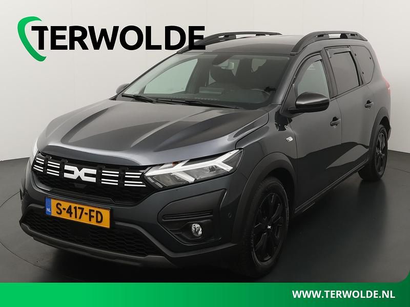 Grijs Gebruikt 2023 Dacia Jogger Extreme MPV | € 20.595 (Iets duurder) - Afbeelding 1/4