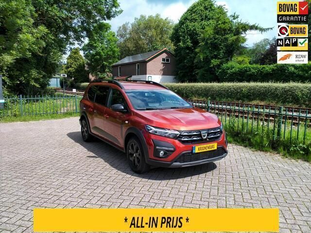 Bruin, metallic lak Gebruikt 2022 Dacia Jogger Comfort MPV | € 21.250 (Goede deal) - Afbeelding 1/4