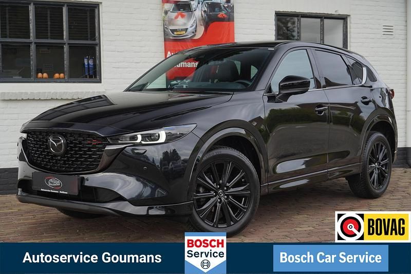 Zwart Gebruikt 2024 Mazda CX-5 Homura-Line SUV | € 40.699 (Eerlijke prijs) - Afbeelding 1/4