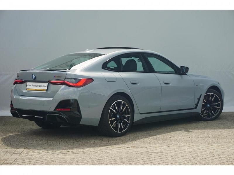 M brooklyn grau Gebruikt 2023 BMW i4 Comfort Edition Sedan | € 55.900 (Eerlijke prijs) - Afbeelding 1/3