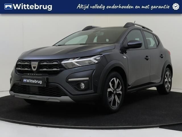 Grijs, metallic lak Gebruikt 2021 Dacia Sandero Comfort Hatchback | € 13.950 (Eerlijke prijs) - Afbeelding 1/3