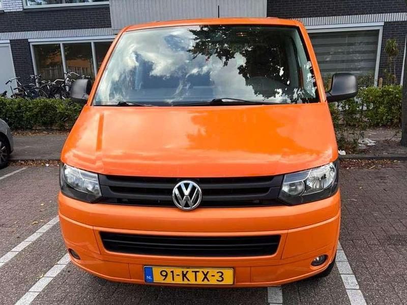 Oranje Gebruikt 2010 VW T5 Highline Van | € 11.000 - Afbeelding 1/4
