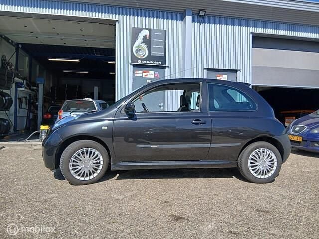 Zwart Gebruikt 2006 Nissan Micra Hatchback | € 999 (Goede deal) - Afbeelding 1/4