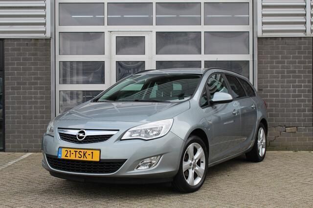 Grijs Gebruikt 2012 Opel Astra Edition Stationwagen | € 6.950 (Eerlijke prijs) - Afbeelding 1/4