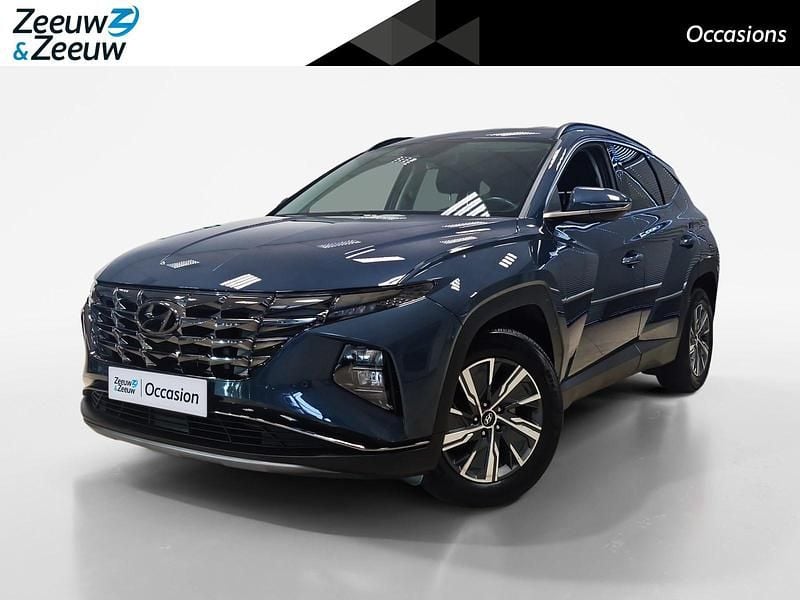 Dark teal metallic (tg8) Gebruikt 2022 Hyundai Tucson SUV | € 27.850 (Goede deal) - Afbeelding 1/4