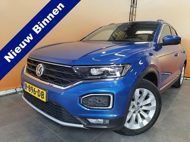 Blauw, metallic lak Gebruikt 2019 VW T-Roc Sport SUV | € 18.900 (Super prijs) - Afbeelding 1/4