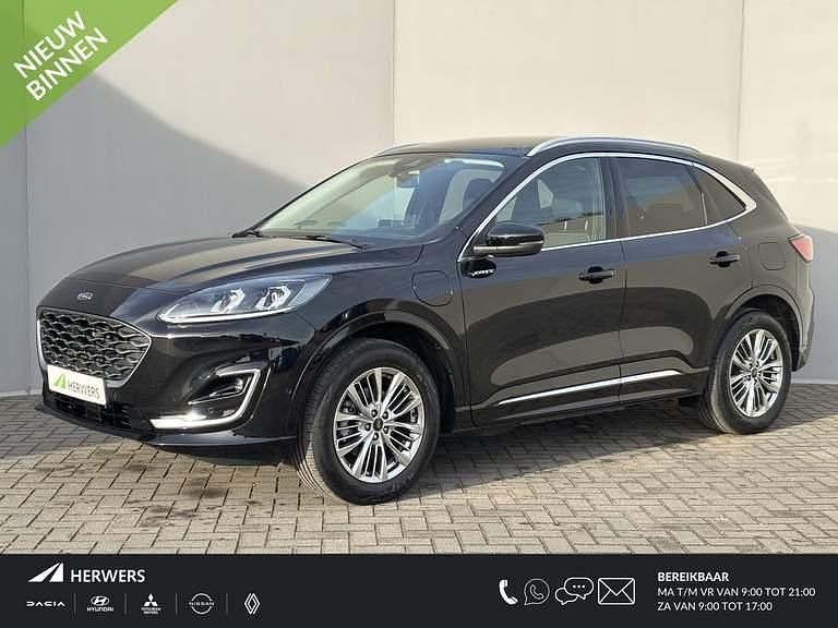 Agate black metallic (pn4gm) Gebruikt 2023 Ford Kuga Vignale SUV | € 30.885 (Eerlijke prijs) - Afbeelding 1/4
