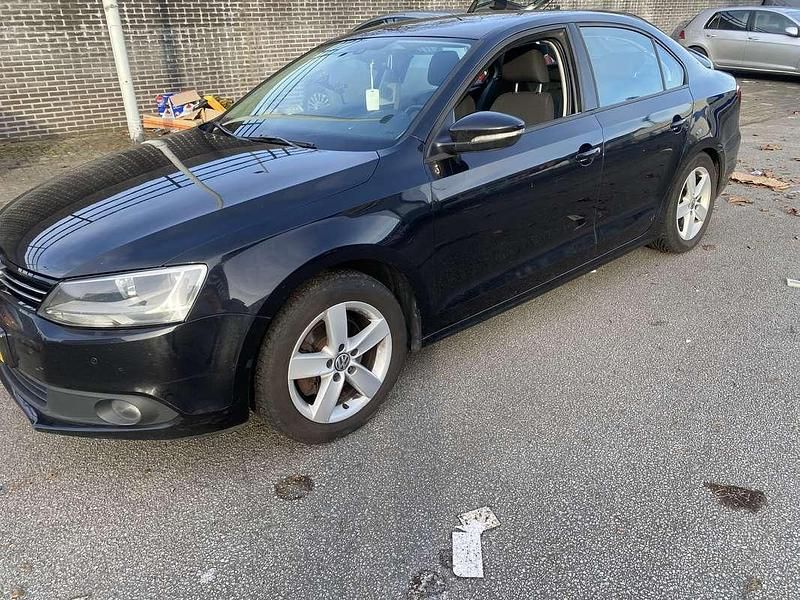 Zwart Gebruikt 2014 VW Jetta Highline Sedan | € 5.700 (Goede deal) - Afbeelding 1/4